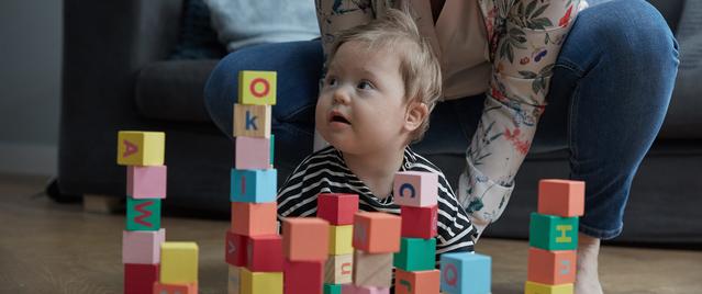 Baby playing with blocks