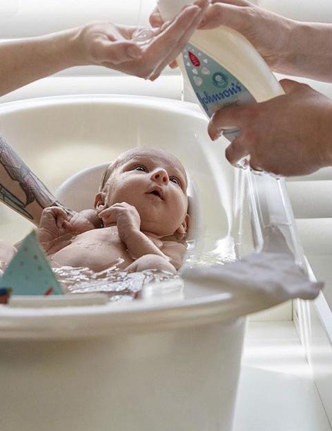 Bathing Newborn with Johnson's® CottonTouch® Wash & Shampoo
