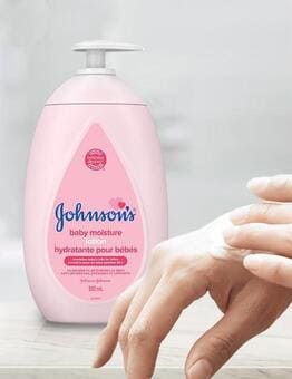 Johnsons® Baby Moisture Lotion used on hand's skin